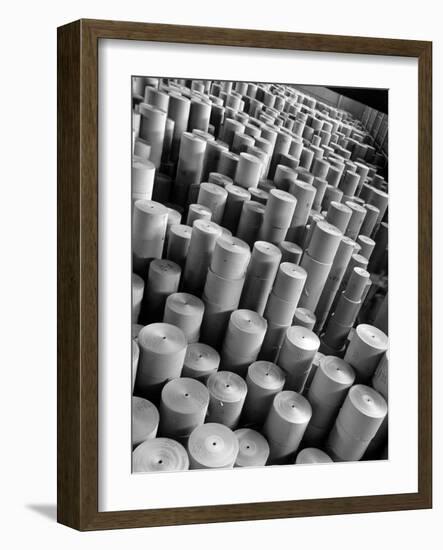 Rolls of Kraft Paper to Be Made into Paper Sacks Sit Stacked in the Union Bag and Paper Corp. Plant-Margaret Bourke-White-Framed Photographic Print