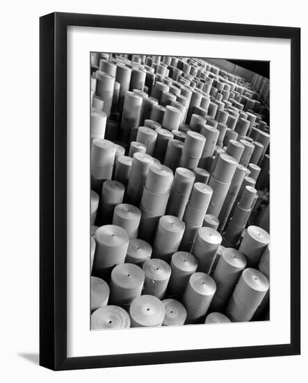 Rolls of Kraft Paper to Be Made into Paper Sacks Sit Stacked in the Union Bag and Paper Corp. Plant-Margaret Bourke-White-Framed Photographic Print