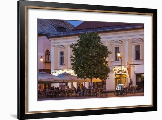 Romania, Baia Mare, Piata Libertatii Square, Outdoor Cafes, Dusk-Walter Bibikow-Framed Photographic Print