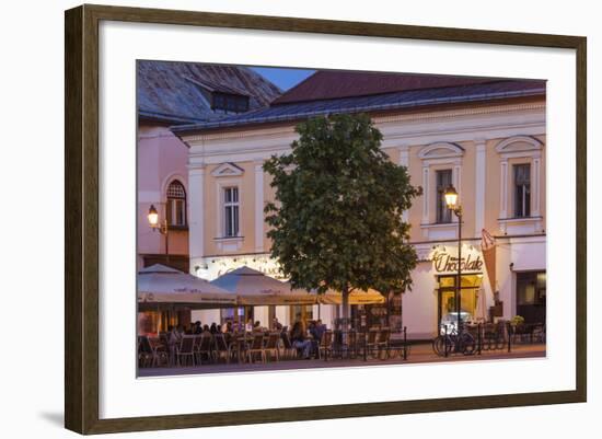 Romania, Baia Mare, Piata Libertatii Square, Outdoor Cafes, Dusk-Walter Bibikow-Framed Photographic Print