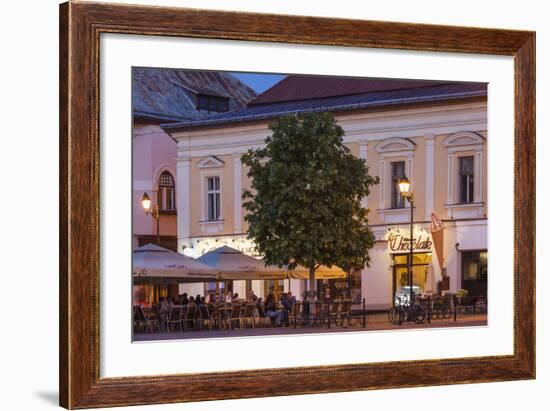 Romania, Baia Mare, Piata Libertatii Square, Outdoor Cafes, Dusk-Walter Bibikow-Framed Photographic Print