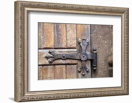 Romania. Brasov. Detail of church exterior. Wood door hinge.-Emily Wilson-Framed Photographic Print