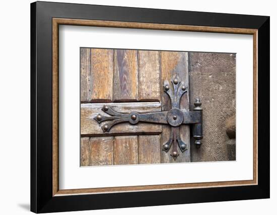 Romania. Brasov. Detail of church exterior. Wood door hinge.-Emily Wilson-Framed Photographic Print