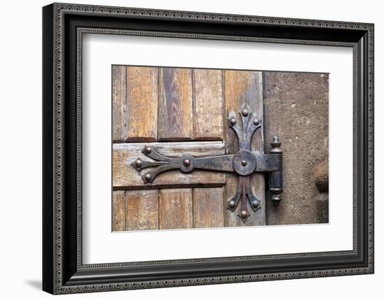 Romania. Brasov. Detail of church exterior. Wood door hinge.-Emily Wilson-Framed Photographic Print