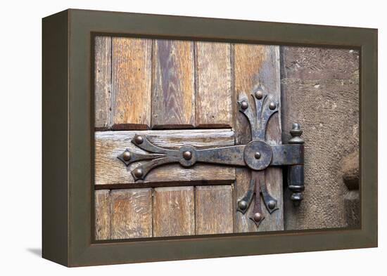 Romania. Brasov. Detail of church exterior. Wood door hinge.-Emily Wilson-Framed Premier Image Canvas