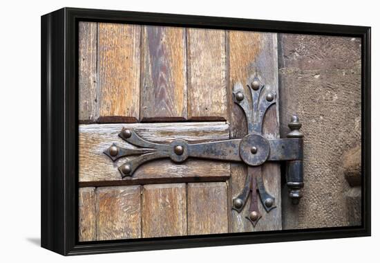 Romania. Brasov. Detail of church exterior. Wood door hinge.-Emily Wilson-Framed Premier Image Canvas