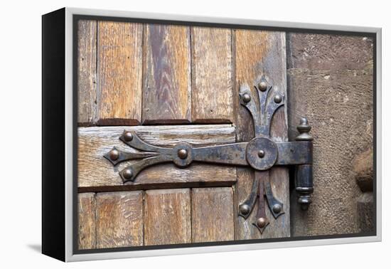 Romania. Brasov. Detail of church exterior. Wood door hinge.-Emily Wilson-Framed Premier Image Canvas