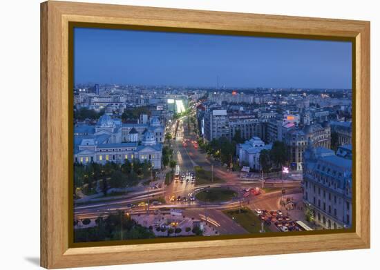 Romania, Bucharest, Piata Universitatii, Coltea Hospital at Dusk-Walter Bibikow-Framed Premier Image Canvas