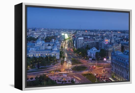 Romania, Bucharest, Piata Universitatii, Coltea Hospital at Dusk-Walter Bibikow-Framed Premier Image Canvas