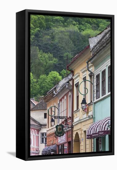 Romania, Transylvania, Brasov, Building Detail-Walter Bibikow-Framed Premier Image Canvas