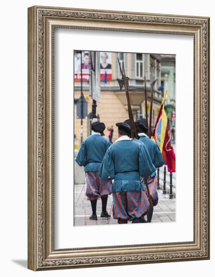 Romania, Transylvania, Brasov, Men Dressed Like Medieval Soldiers-Walter Bibikow-Framed Photographic Print