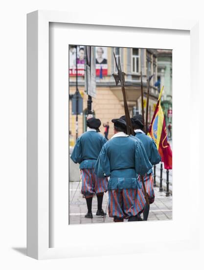 Romania, Transylvania, Brasov, Men Dressed Like Medieval Soldiers-Walter Bibikow-Framed Photographic Print