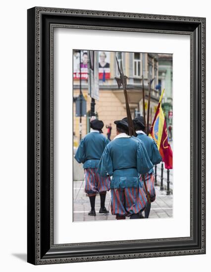 Romania, Transylvania, Brasov, Men Dressed Like Medieval Soldiers-Walter Bibikow-Framed Photographic Print