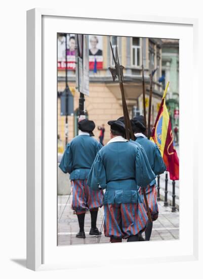 Romania, Transylvania, Brasov, Men Dressed Like Medieval Soldiers-Walter Bibikow-Framed Photographic Print