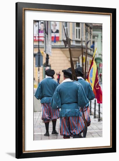 Romania, Transylvania, Brasov, Men Dressed Like Medieval Soldiers-Walter Bibikow-Framed Photographic Print