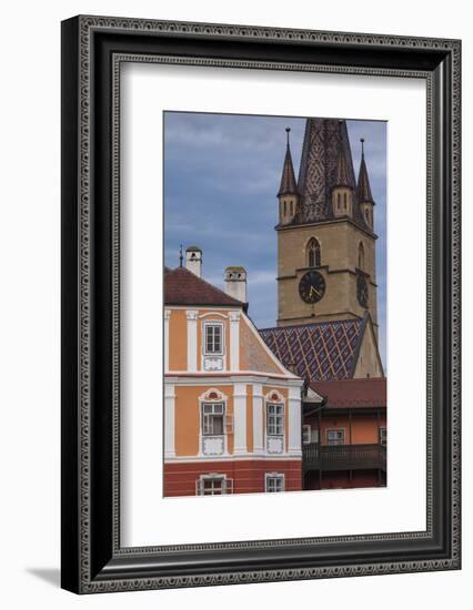 Romania, Transylvania, Sibiu, Piata Mare Square, Building and Church-Walter Bibikow-Framed Photographic Print