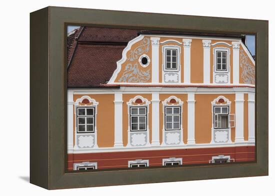 Romania, Transylvania, Sibiu, Piata Mare Square, Building Detail-Walter Bibikow-Framed Premier Image Canvas