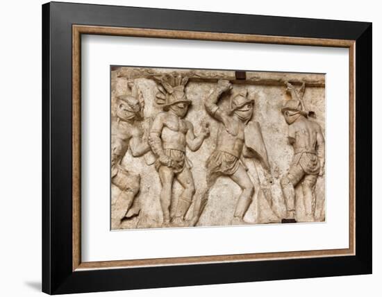 Rome, Italy. Bas relief in the Colosseum of gladiators fighting.-null-Framed Photographic Print