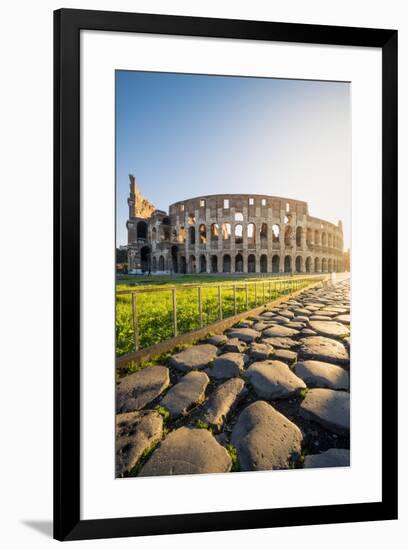 Rome, Lazio, Italy. Colosseum and Via Sacra (Sacred Road) at sunrise.-Marco Bottigelli-Framed Photographic Print