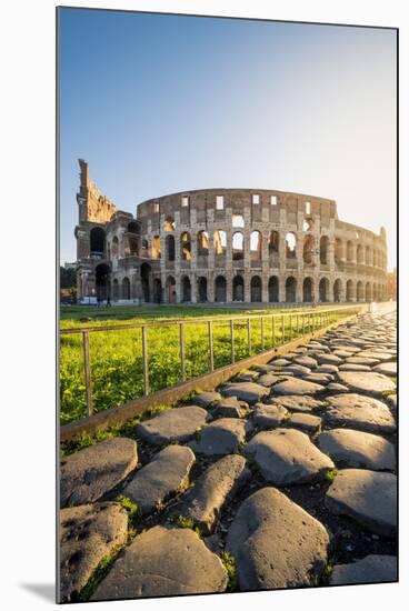 Rome, Lazio, Italy. Colosseum and Via Sacra (Sacred Road) at sunrise.-Marco Bottigelli-Mounted Photographic Print