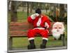 Ronald Guzman, Who Works as Santa Claus, Takes a Break in a Public Park in Lima, Peru-null-Mounted Photographic Print