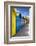 Row of Colourful Beach Huts and their Shadows with Green Hill Backdrop-Eleanor Scriven-Framed Photographic Print