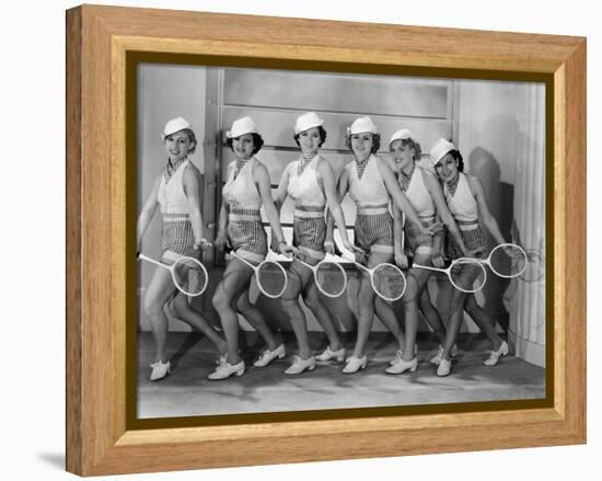 Row of Female Tennis Players in Matching Outfits-null-Framed Stretched Canvas