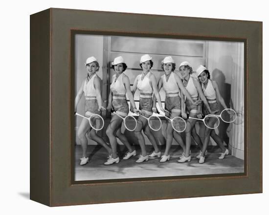 Row of Female Tennis Players in Matching Outfits-null-Framed Stretched Canvas