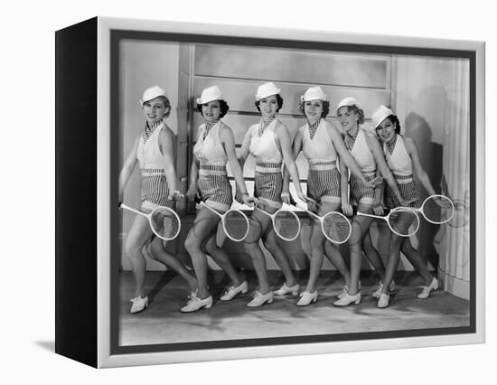 Row of Female Tennis Players in Matching Outfits-null-Framed Stretched Canvas