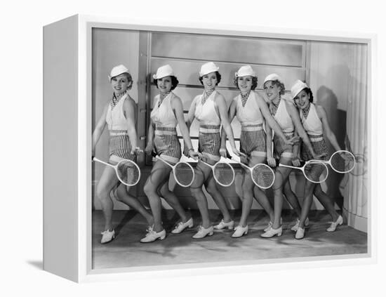 Row of Female Tennis Players in Matching Outfits-null-Framed Stretched Canvas