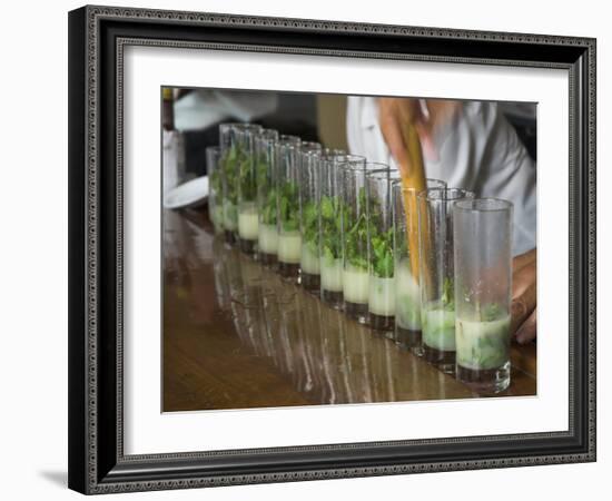 Row of Glasses on a Bar with Barman Preparing Mojito Cocktails, Habana Vieja, Havana, Cuba-Eitan Simanor-Framed Photographic Print