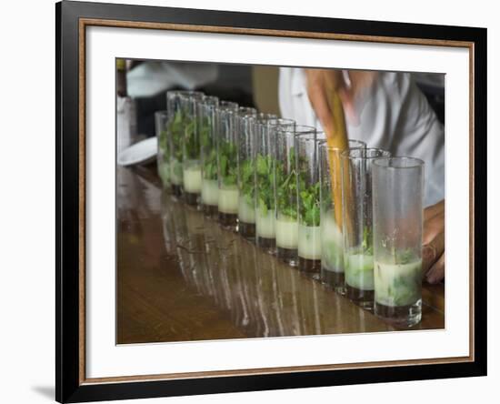 Row of Glasses on a Bar with Barman Preparing Mojito Cocktails, Habana Vieja, Havana, Cuba-Eitan Simanor-Framed Photographic Print