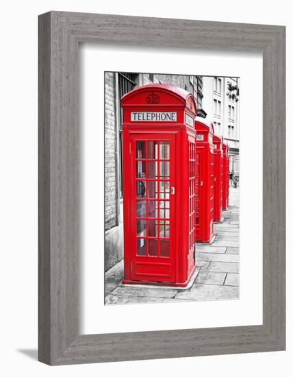 Row Of Iconic London Red Phone Cabins With The Rest Of The Picture In Black And White-Kamira-Framed Photographic Print