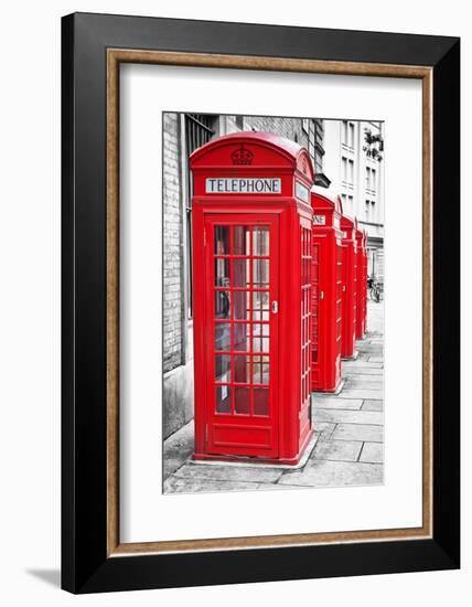 Row Of Iconic London Red Phone Cabins With The Rest Of The Picture In Black And White-Kamira-Framed Photographic Print