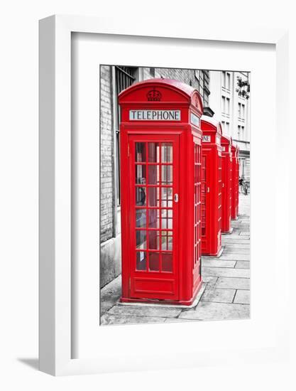 Row Of Iconic London Red Phone Cabins With The Rest Of The Picture In Black And White-Kamira-Framed Photographic Print