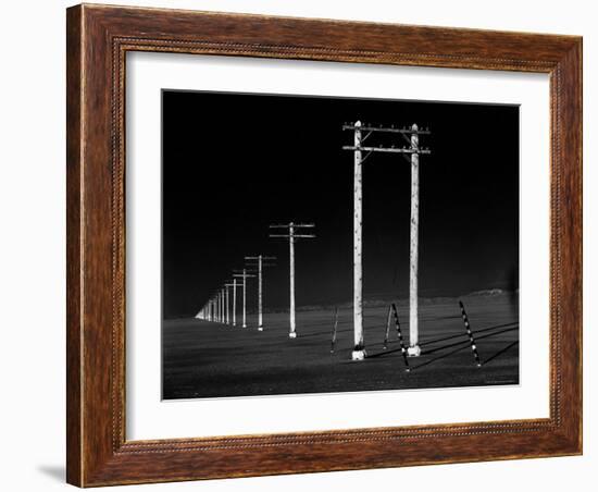 Row of Telephone Poles Along Bonneville Salt Flats-Fritz Goro-Framed Photographic Print