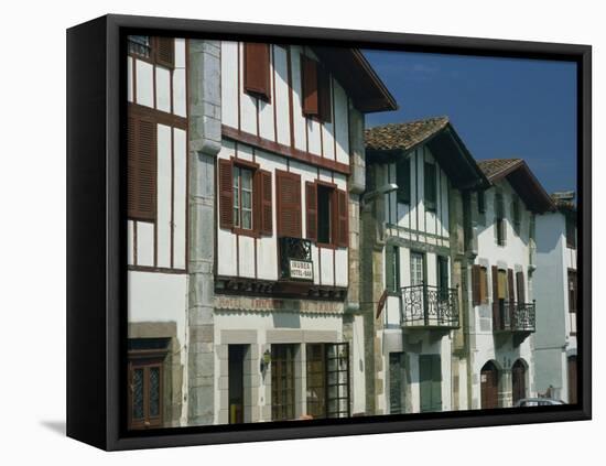 Row of Traditional Buildings in the Village of Ainhoa in the Pyrenees in Aquitaine, France-Michael Busselle-Framed Premier Image Canvas