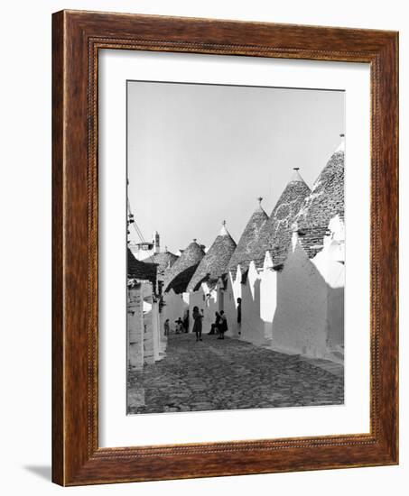 Row of Trulli Homes Made from Limestone Boulders and Feature Conical or Domed Roofs-Alfred Eisenstaedt-Framed Photographic Print