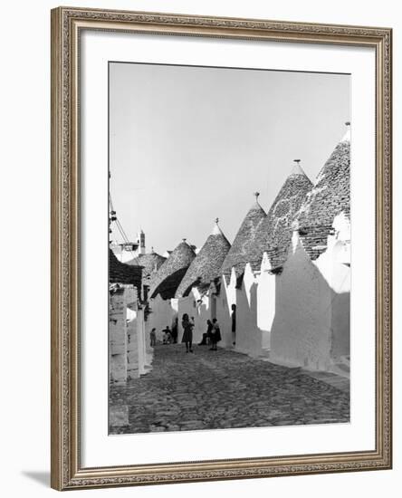 Row of Trulli Homes Made from Limestone Boulders and Feature Conical or Domed Roofs-Alfred Eisenstaedt-Framed Photographic Print