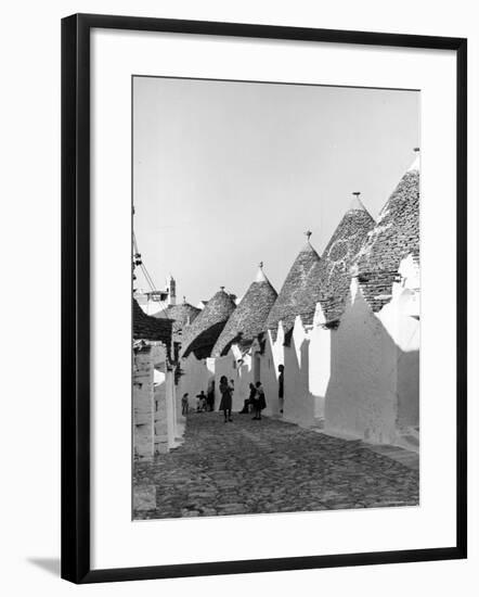 Row of Trulli Homes Made from Limestone Boulders and Feature Conical or Domed Roofs-Alfred Eisenstaedt-Framed Photographic Print