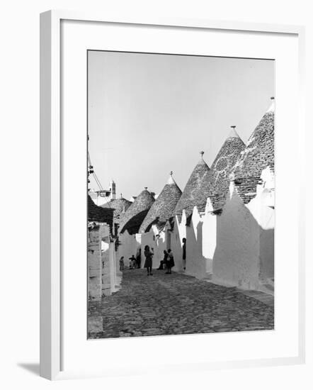 Row of Trulli Homes Made from Limestone Boulders and Feature Conical or Domed Roofs-Alfred Eisenstaedt-Framed Photographic Print