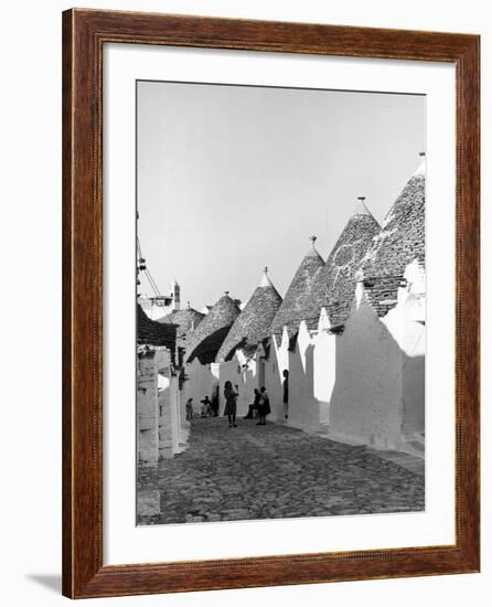 Row of Trulli Homes Made from Limestone Boulders and Feature Conical or Domed Roofs-Alfred Eisenstaedt-Framed Photographic Print