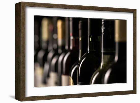 Row of Vintage Wine Bottles in a Wine Cellar (Shallow Dof; Color Toned Image)-l i g h t p o e t-Framed Photographic Print