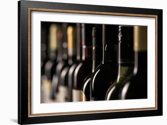 Row of Vintage Wine Bottles in a Wine Cellar (Shallow Dof; Color Toned Image)-l i g h t p o e t-Framed Photographic Print