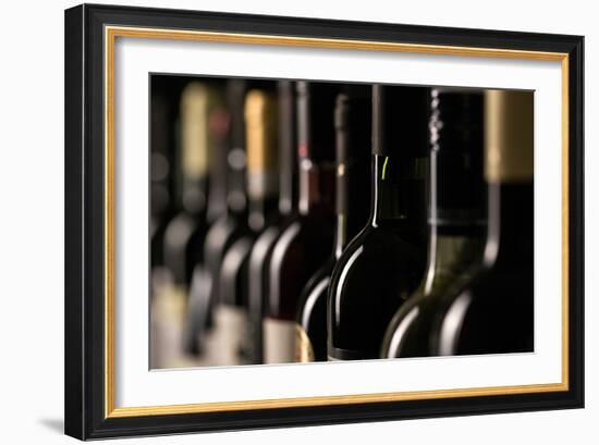 Row of Vintage Wine Bottles in a Wine Cellar (Shallow Dof; Color Toned Image)-l i g h t p o e t-Framed Photographic Print