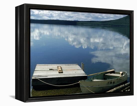 Rowboat Moored at Edge of Lake Showing Reflections of Clouds in Its Still Waters, in New England-Dmitri Kessel-Framed Premier Image Canvas