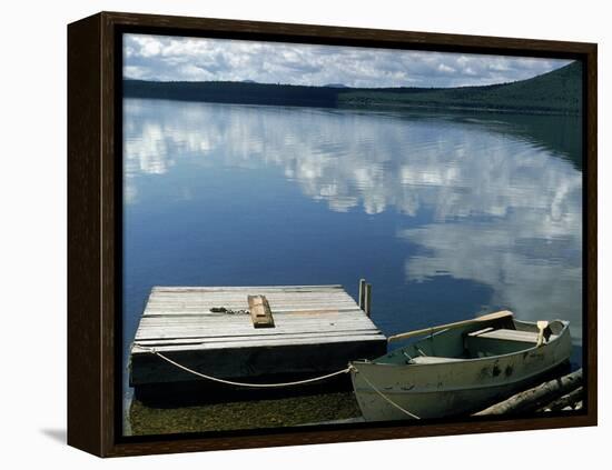 Rowboat Moored at Edge of Lake Showing Reflections of Clouds in Its Still Waters, in New England-Dmitri Kessel-Framed Premier Image Canvas