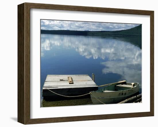 Rowboat Moored at Edge of Lake Showing Reflections of Clouds in Its Still Waters, in New England-Dmitri Kessel-Framed Photographic Print