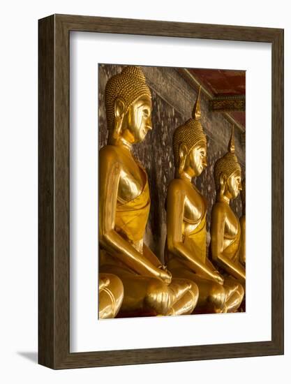 Rows of Gold Buddha Statues, Wat Suthat Temple, Bangkok, Thailand, Southeast Asia, Asia-Stephen Studd-Framed Photographic Print