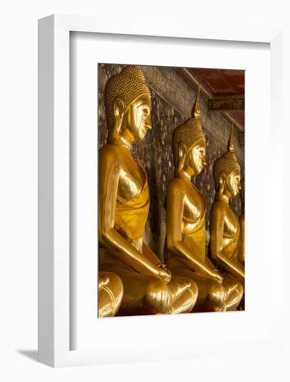 Rows of Gold Buddha Statues, Wat Suthat Temple, Bangkok, Thailand, Southeast Asia, Asia-Stephen Studd-Framed Photographic Print